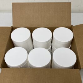 An open carton of white containers